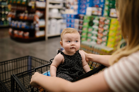 mother and daughter grocery shopping togetherの写真素材
