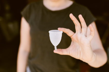 woman holding a menstrual cupの写真素材