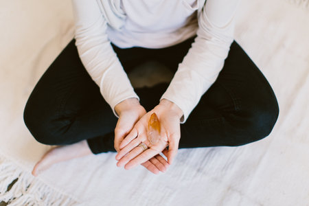 woman holding a crystal