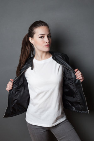 young attractive woman in white t-shirt and black leather jacket  studio shot,  mock up