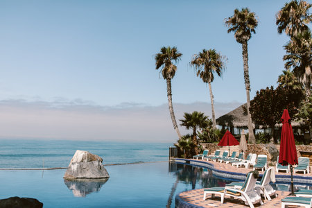 mexican resort infinity pool overlooking the ocean in mexicoの写真素材