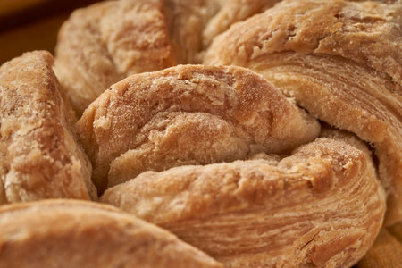 braided homemade bread on tableclothの写真素材