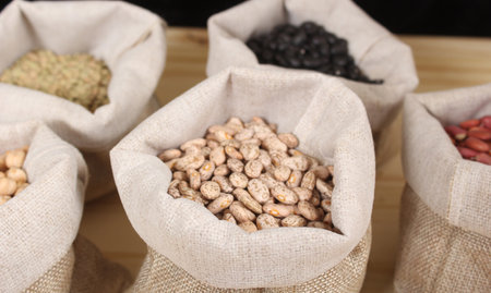 Burlap Bags of Mixed Beans in Marketの写真素材