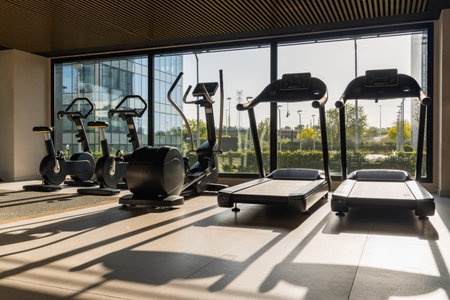 Electric Treadmill equipment in the gym with abstract shadowsの写真素材