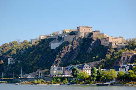 View across the river Rhine to the fortress "Ehrenbreitstein" in Koblenz, Germany on a sunny day with a clear blue skyのeditorial素材