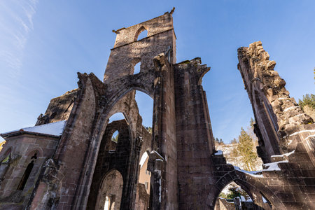 A low angle shot of the ruins of All Saints' Abbey in the Black Forest, Germanyのeditorial素材