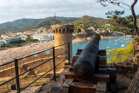 Beautiful war cannon in the castle of Tossa de Mar in summer, Girona on the Costa Brava of Catalonia in the Mediterraneanの写真素材