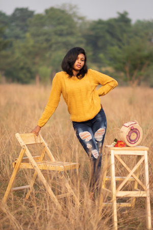 portrait of a beautiful african woman in a fieldの写真素材