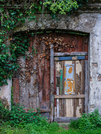 Old door very deteriorated.