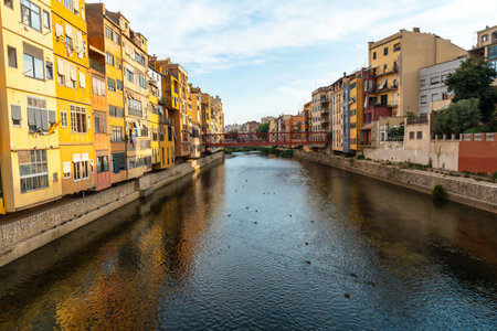 Girona medieval city from the famous red bridge Pont de les Peixateries Velles, Costa Brava of...