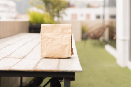 Business woman on her lunch break, enjoying the outdoors on the terrace.の写真素材