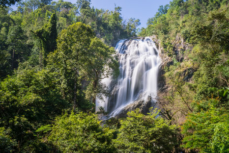 Khlong Lan Waterfall, large and exotic waterfall in tropical forest in National Park, Kamphaeng Phet, Thailandの写真素材