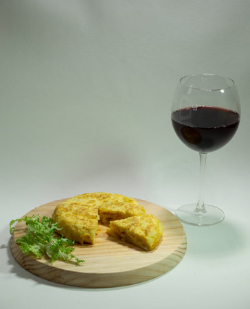 process of elaboration of potato omelette in spain in a frying panの写真素材