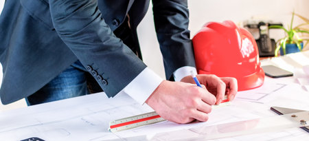 Professional Architect, Interior male designer working on building Architecture project.