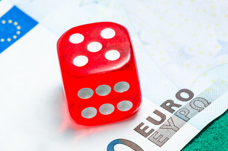 red dice and five euro
