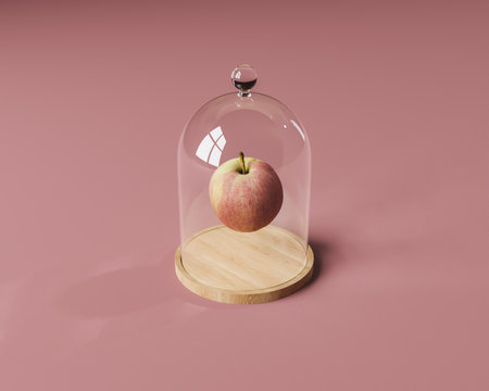 minimalist scene of an apple inside a glass dome. 3d renderの写真素材
