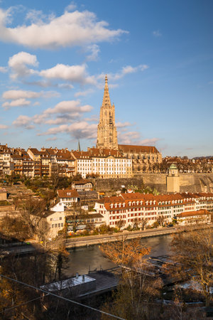 Bern Cathedral and the river on a sunny dayの写真素材