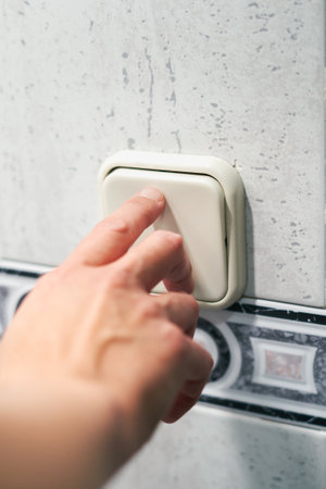 Control on the light switch, electrical energy saving concept