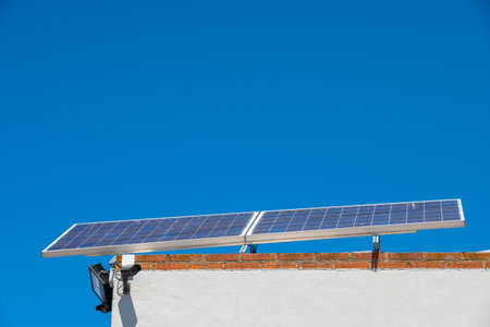 Small solar panel at the top of a tower that provides public services to citizens.