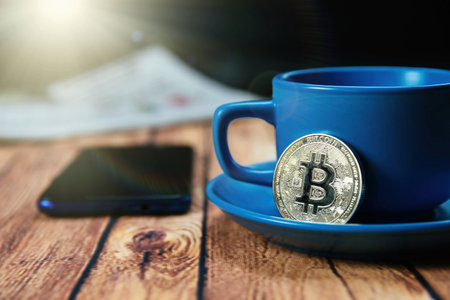 Morning bitcoin crypto-currency news and a cup of tasty coffee.の写真素材