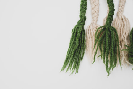 hand knitted soft wool on a white background with copy spaceの写真素材