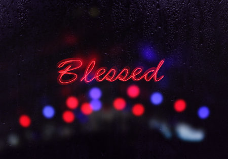 Vintage Neon Blessed Sign in Rainy Windowの写真素材