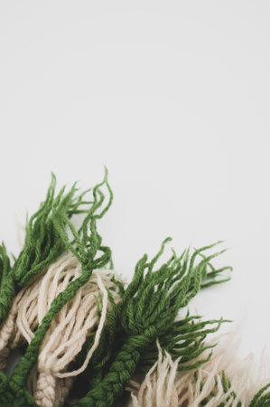 hand knitted soft wool on a white background with copy spaceの写真素材