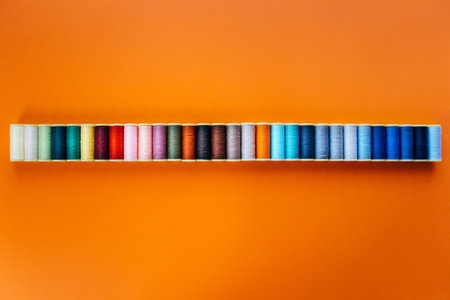 Colored thread for sewing. Threads in spools tape measureの写真素材