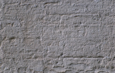 Background of gray, concrete surface with horizontal scratches from old wall, texture of damaged concrete surface, blank template for banner designの写真素材