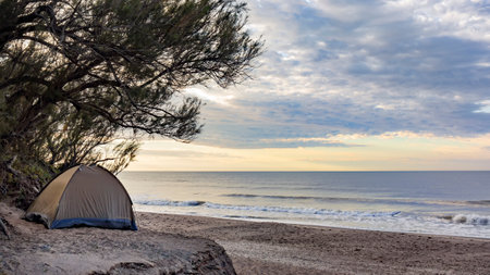 small tent set up by the seaの写真素材