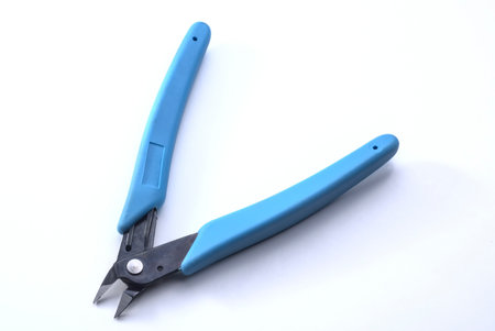 small pliers for use in electronics. White backgroundの写真素材
