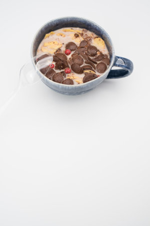 Fresh tasty breakfast with milk and chocolate cereal with copy spaceの写真素材
