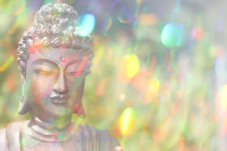 Buddha Statue Outdoors in Garden With Blurred Background