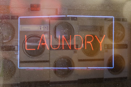Neon Sign Laundry in Rainy Window Signの写真素材