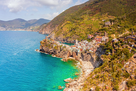 Vernazza village in Cinque Terre, Italy, aerial drone view on a sunny day