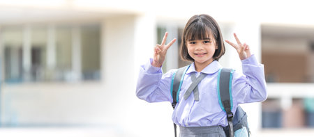 Portrait of children student in uniform and backpack Looking at camera going back to school after covid-19 quarantine and lockdown. Back to School Concept Stock Photoの写真素材