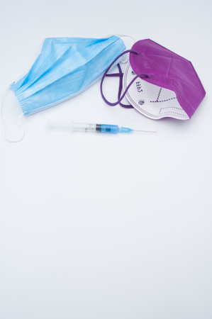 Isolated respiratory mask with syringe on a white background wit text spaceの写真素材