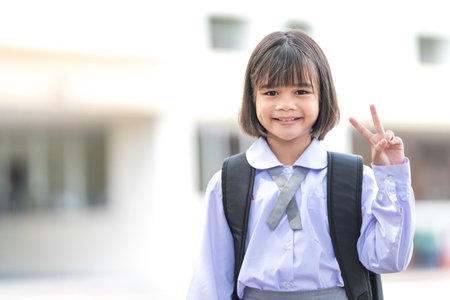 Portrait of children student in uniform and backpack Looking at camera going back to school after...