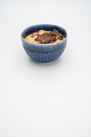 Fresh tasty breakfast with milk and chocolate cereal with copy spaceの写真素材