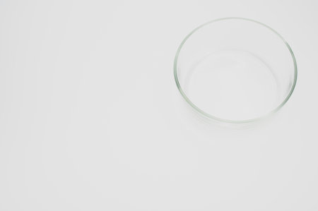 isolated empty glass bowl on a white background with space for textの写真素材