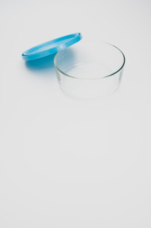 isolated empty glass bowl on a white background with space for textの写真素材