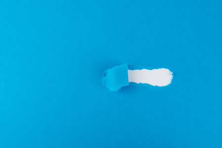 Torn paper with the possibility to insert a textの写真素材