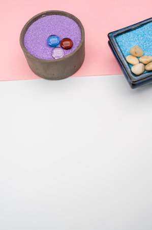 isolated terracotta vases with decorative sand and pebbles with space for text