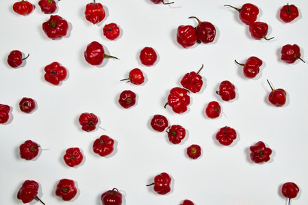 Red chilli peppers on white background