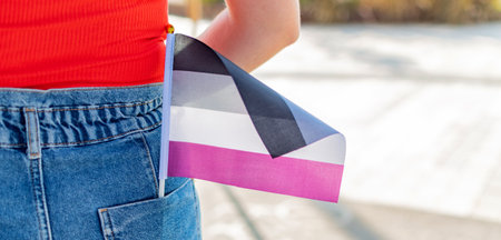 Small lgbt Asexual pride flag in jeans pocket. LGBT pride flag.