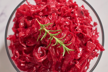 Home-fermented red cabbage sauerkraut in a glass bowl.の写真素材