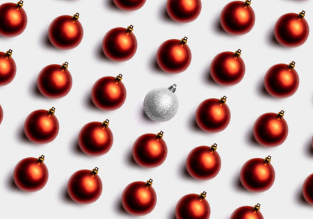 Christmas composition. Gifts, fir tree bran. Red decorations on white background. Christmas, winter, new year concept. Flat lay, top view, copy spaceの写真素材