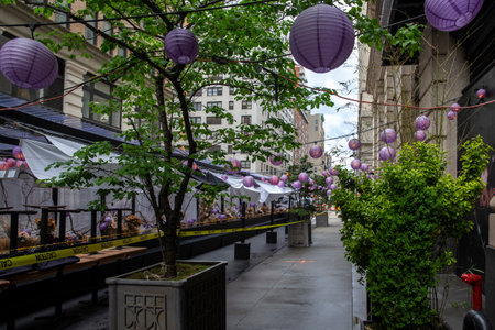 An empty, not open yet, outdoor restaurant during covid outbreak. Restaurants started serving meals outdoors due to pandemic dining rules.のeditorial素材