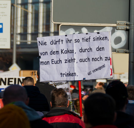 Leipzig, Germany - November 07, 2020: At a demonstration against the German government's measures against the coronavirus, people hold up signsのeditorial素材