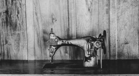 Old sewing machine in black and white.